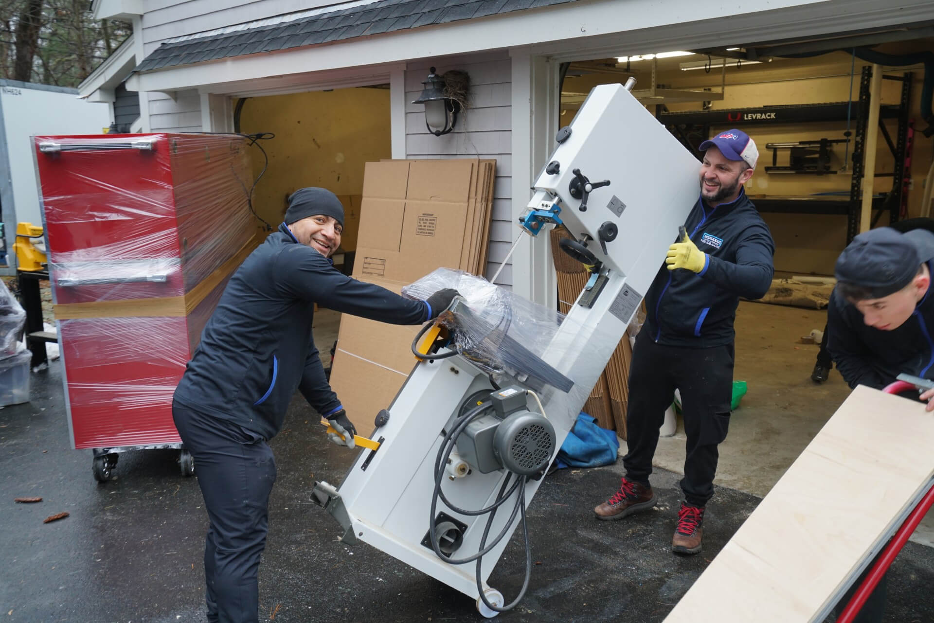 Professional movers working carefully